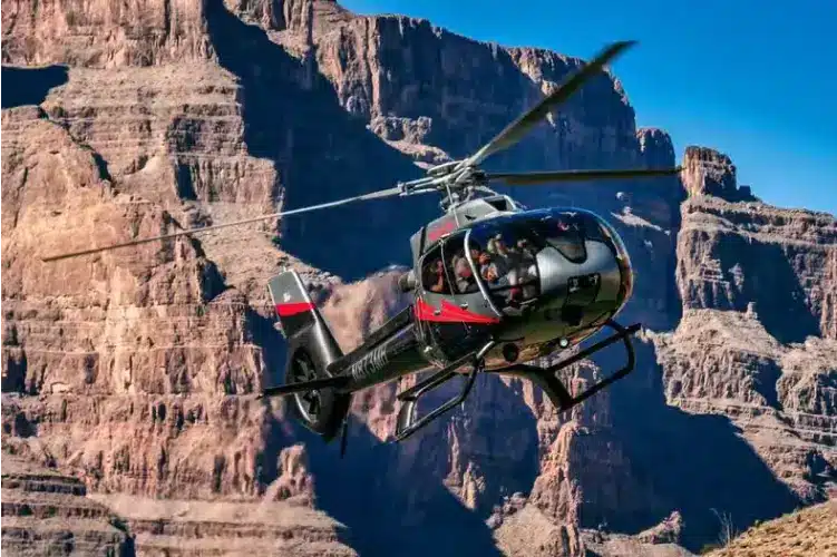 Helicopter flying in the Grand Canyon.